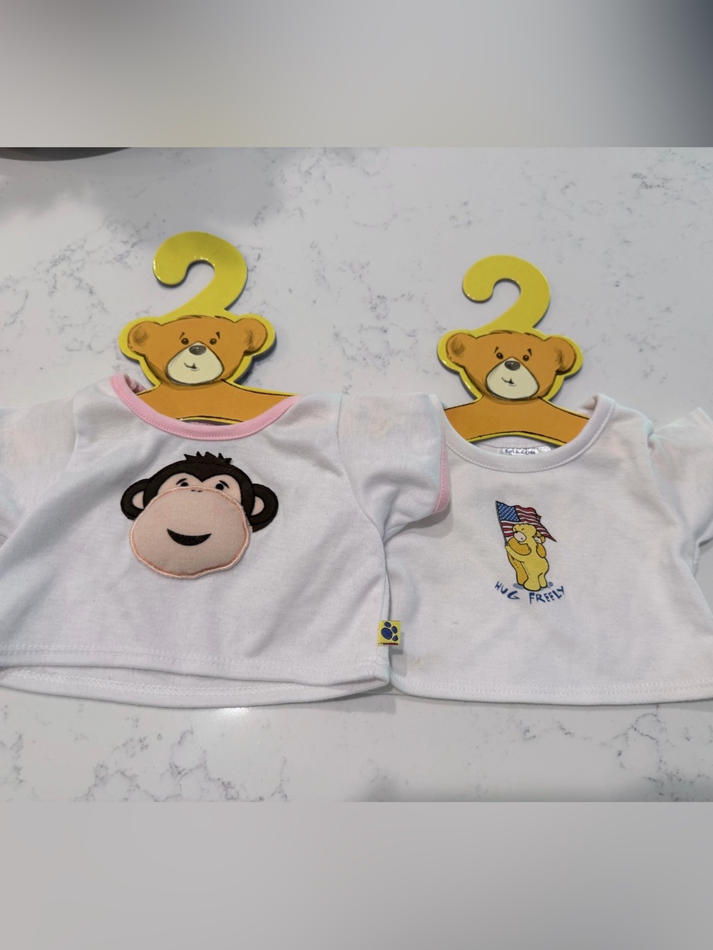 Set of 2 Y2K build a bear t-shirts and hangers